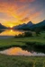 Serene landscape at sunset, tranquil lake